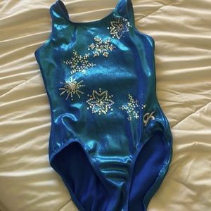 A blue Gk gymnastics leotard in a child medium.